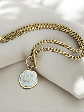 CHANEL Gold Chain Necklace with White CC Medallion